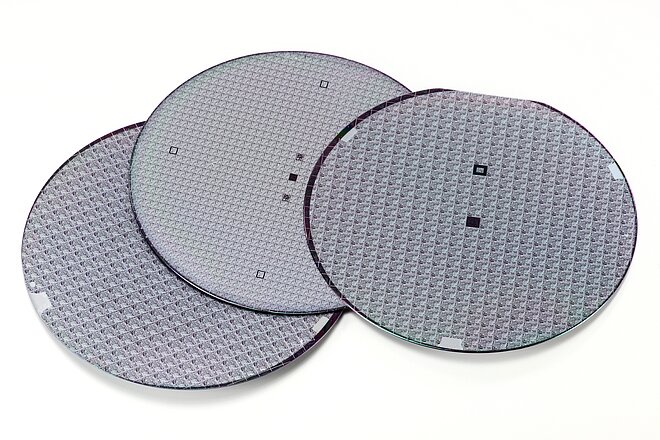 Wafer - Round discs of silicon that serve as the basis for ICs