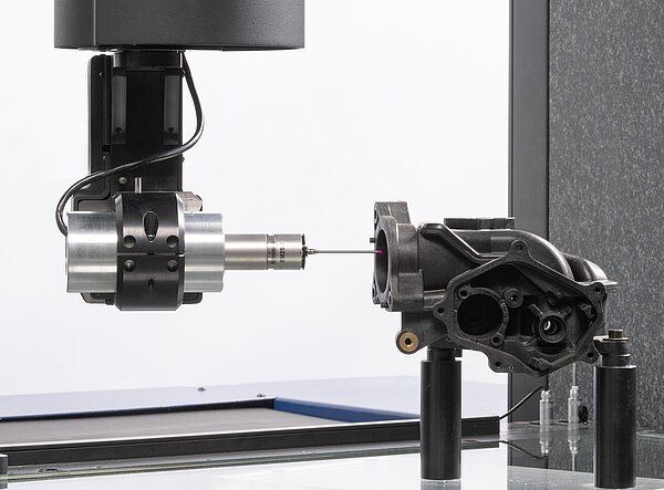 Infinitely variable rotary/tilt head for optical distance sensors and tactile sensors