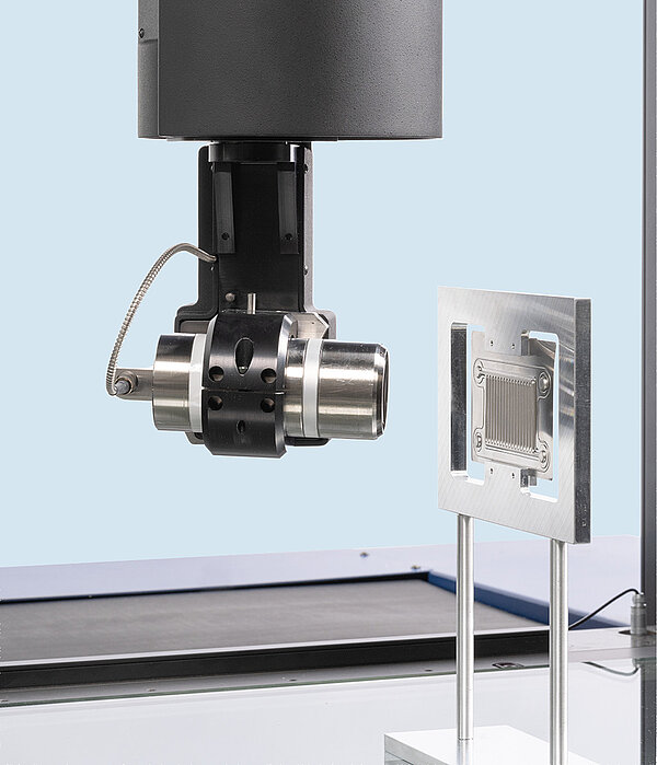 Infinitely variable rotary/tilt head for optical distance sensors and tactile sensors